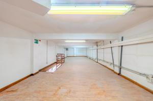 LOCAL COMERCIAL DE 300 M² EN CALLE PORLIER CON OPCIÓN DE DIVISIÓN EN DOS UNIDADES.