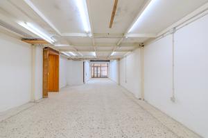 LOCAL COMERCIAL DE 300 M² EN CALLE PORLIER CON OPCIÓN DE DIVISIÓN EN DOS UNIDADES.
